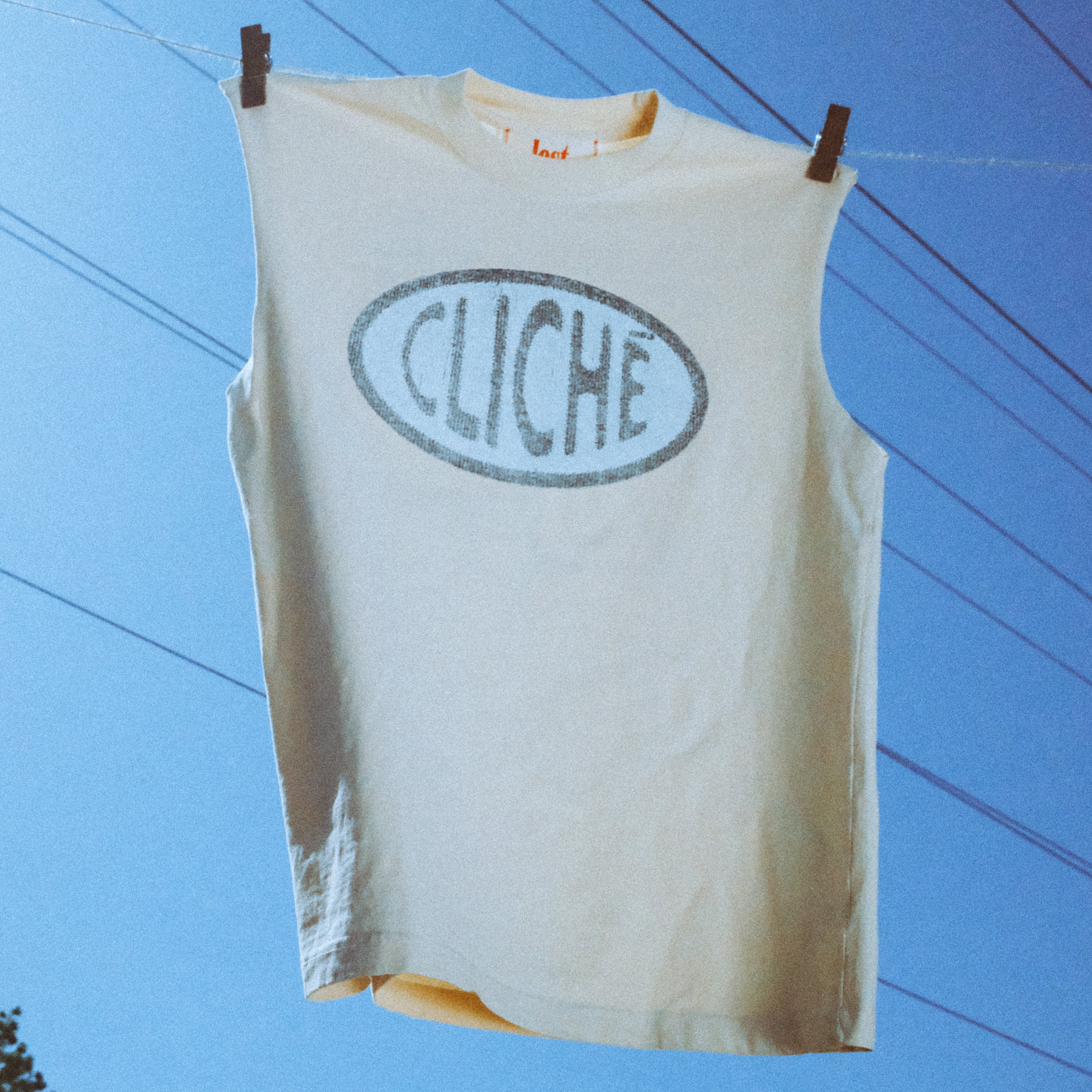 cliché cream cut off tank